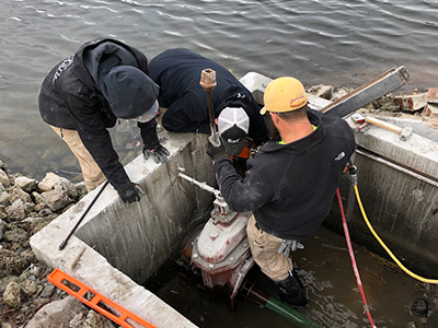 Two Men Working